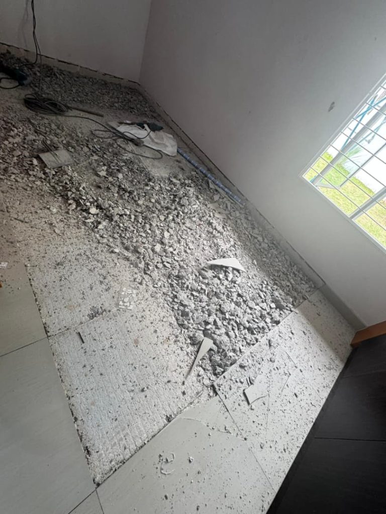 Replacement of Popped Floor Tiles before renovation